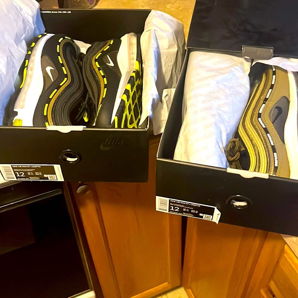 97 air Max undefeated edition one in Black Volt, the other is in militia green